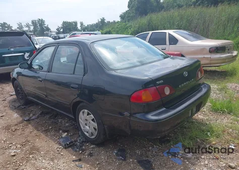 2001 Toyota Corolla S z USA, uszkodzony, nr VIN 2T1BR12EX1C474686